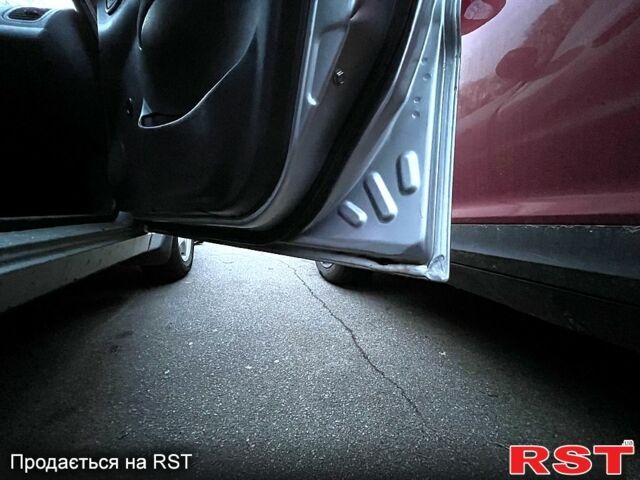 Серый Дэу Ланос, объемом двигателя 1.4 л и пробегом 124 тыс. км за 1999 $, фото 5 на Automoto.ua