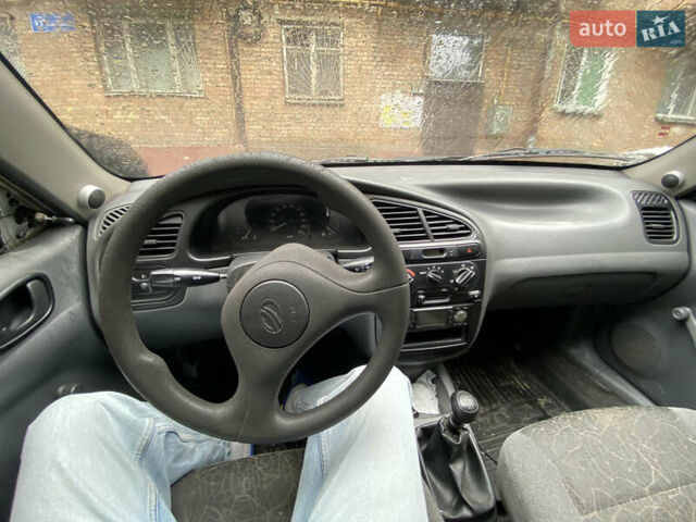 Сірий Деу Ланос, об'ємом двигуна 1.5 л та пробігом 241 тис. км за 1500 $, фото 7 на Automoto.ua