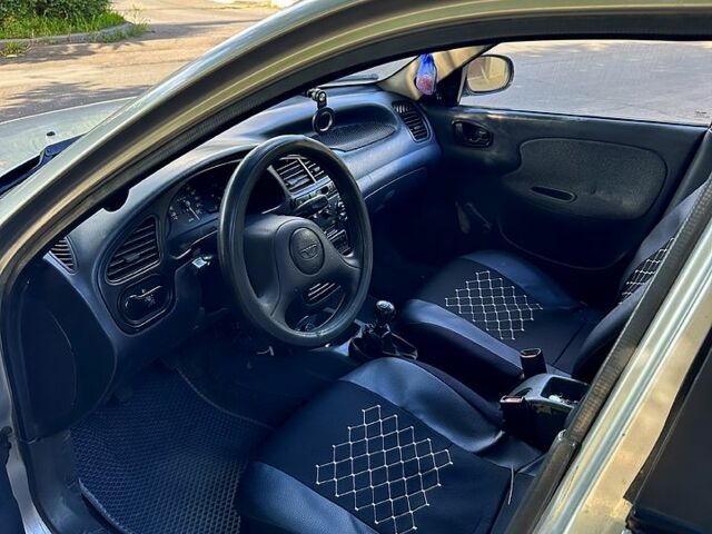 Сірий Деу Ланос, об'ємом двигуна 1.4 л та пробігом 170 тис. км за 1350 $, фото 4 на Automoto.ua