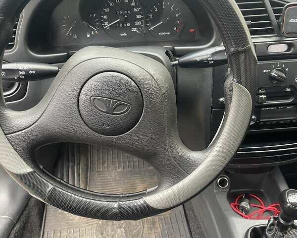 Серый Дэу Ланос, объемом двигателя 1.5 л и пробегом 159 тыс. км за 2300 $, фото 10 на Automoto.ua