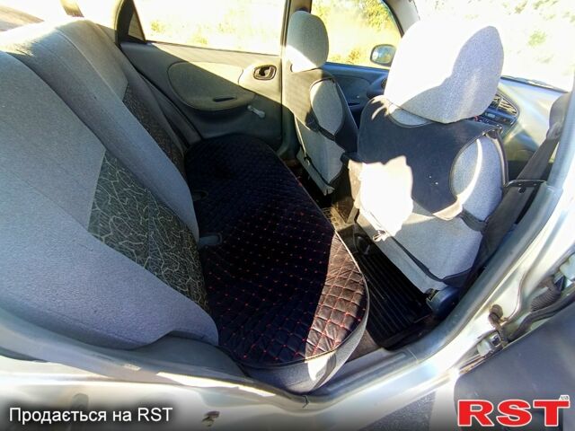 Сірий Деу Ланос, об'ємом двигуна 1.5 л та пробігом 0 тис. км за 1750 $, фото 9 на Automoto.ua