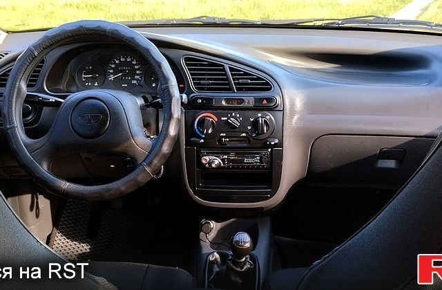 Серый Дэу Ланос, объемом двигателя 1.4 л и пробегом 225 тыс. км за 2700 $, фото 3 на Automoto.ua