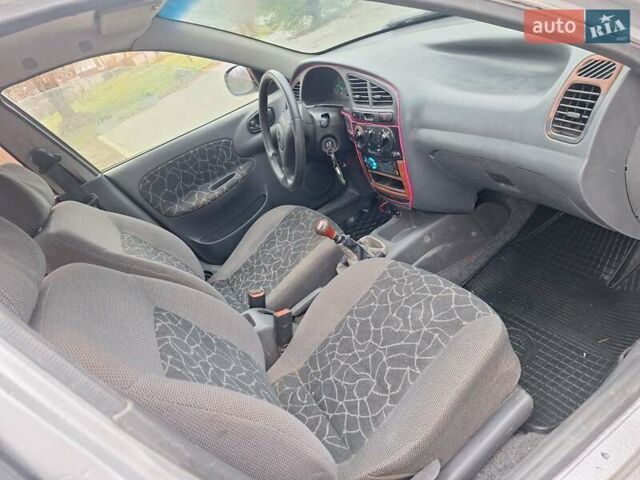 Сірий Деу Ланос, об'ємом двигуна 1.3 л та пробігом 111 тис. км за 1100 $, фото 22 на Automoto.ua