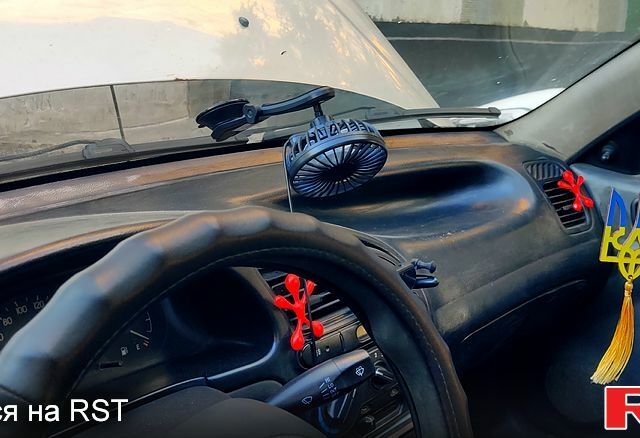 Серый Дэу Ланос, объемом двигателя 1.5 л и пробегом 439 тыс. км за 1500 $, фото 5 на Automoto.ua