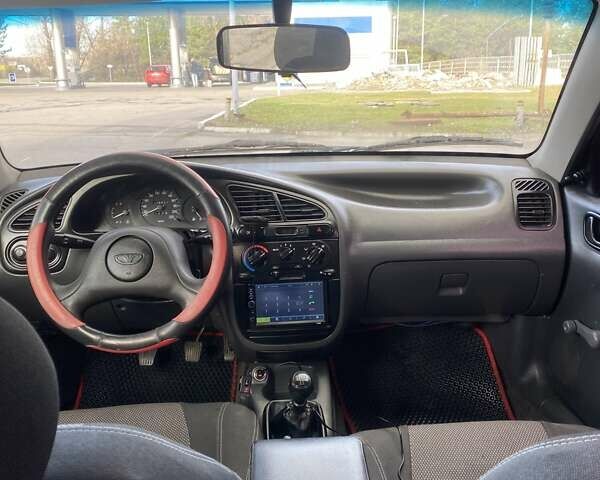 Серый Дэу Ланос, объемом двигателя 1.5 л и пробегом 278 тыс. км за 2000 $, фото 13 на Automoto.ua