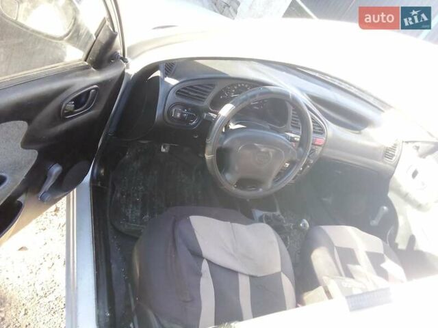 Сірий Деу Ланос, об'ємом двигуна 1.5 л та пробігом 225 тис. км за 1150 $, фото 4 на Automoto.ua