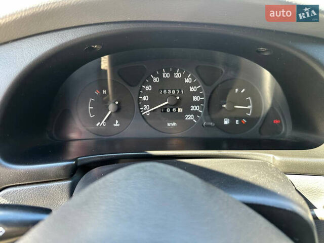 Сірий Деу Ланос, об'ємом двигуна 1.5 л та пробігом 284 тис. км за 2600 $, фото 6 на Automoto.ua
