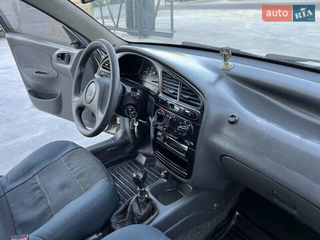 Серый Дэу Ланос, объемом двигателя 1.5 л и пробегом 230 тыс. км за 2650 $, фото 38 на Automoto.ua