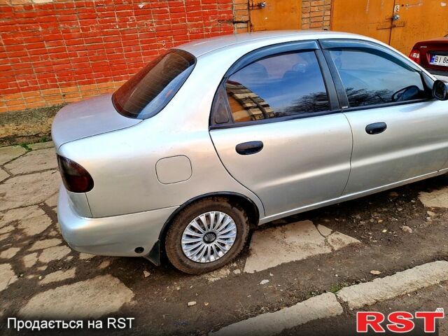 Серый Дэу Ланос, объемом двигателя 1.5 л и пробегом 190 тыс. км за 1900 $, фото 2 на Automoto.ua