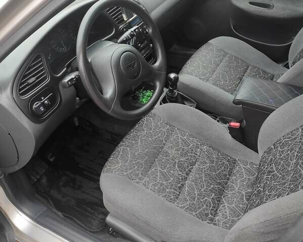 Серый Дэу Ланос, объемом двигателя 1.5 л и пробегом 200 тыс. км за 1750 $, фото 13 на Automoto.ua