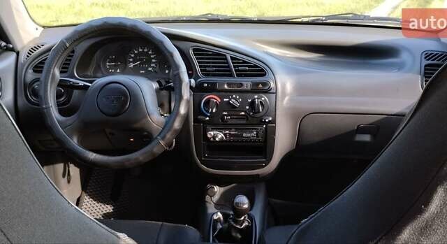 Серый Дэу Ланос, объемом двигателя 1.4 л и пробегом 225 тыс. км за 2700 $, фото 2 на Automoto.ua