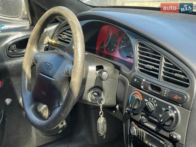 Серый Дэу Ланос, объемом двигателя 1.5 л и пробегом 290 тыс. км за 2500 $, фото 40 на Automoto.ua