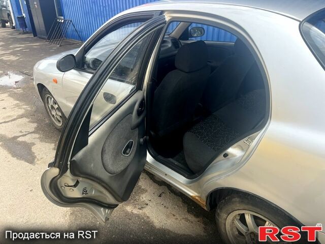 Серый Дэу Ланос, объемом двигателя 1.4 л и пробегом 171 тыс. км за 1800 $, фото 7 на Automoto.ua