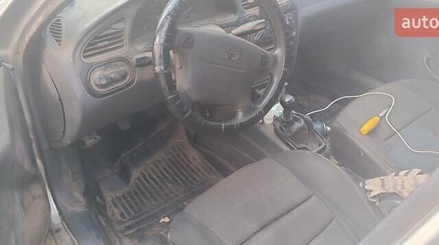 Сірий Деу Ланос, об'ємом двигуна 1.6 л та пробігом 290 тис. км за 1000 $, фото 3 на Automoto.ua