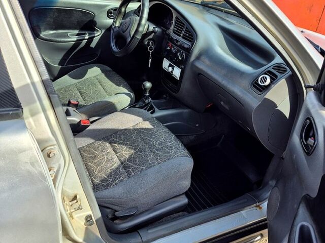 Серый Дэу Ланос, объемом двигателя 1.5 л и пробегом 220 тыс. км за 1500 $, фото 2 на Automoto.ua