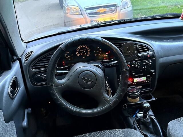 Сірий Деу Ланос, об'ємом двигуна 1.4 л та пробігом 183 тис. км за 1650 $, фото 8 на Automoto.ua