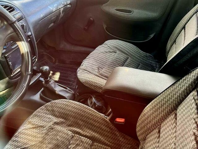 Сірий Деу Ланос, об'ємом двигуна 1.5 л та пробігом 220 тис. км за 1750 $, фото 3 на Automoto.ua