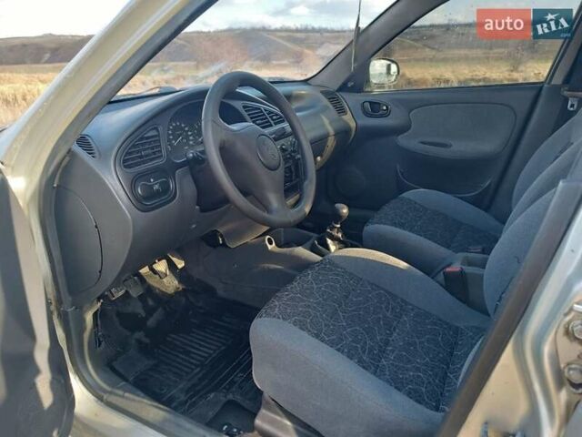 Серый Дэу Ланос, объемом двигателя 1.6 л и пробегом 299 тыс. км за 1720 $, фото 1 на Automoto.ua