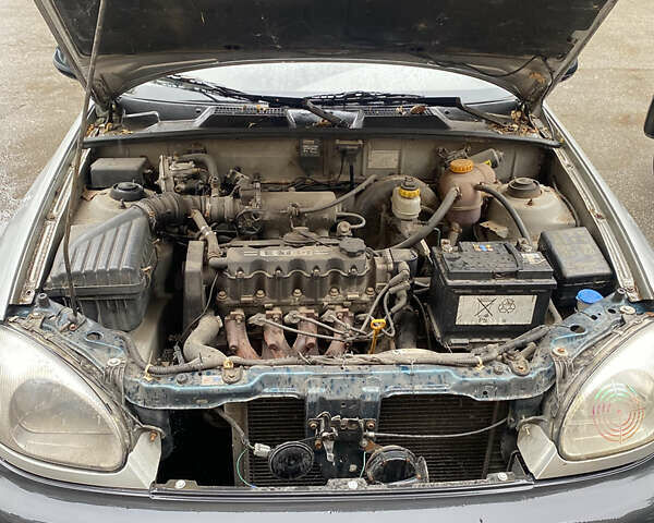 Сірий Деу Ланос, об'ємом двигуна 1.5 л та пробігом 241 тис. км за 1500 $, фото 4 на Automoto.ua