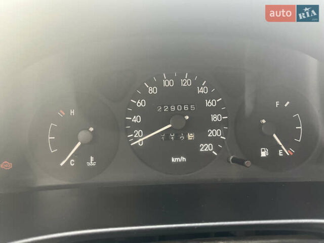 Сірий Деу Ланос, об'ємом двигуна 1.39 л та пробігом 220 тис. км за 2200 $, фото 3 на Automoto.ua