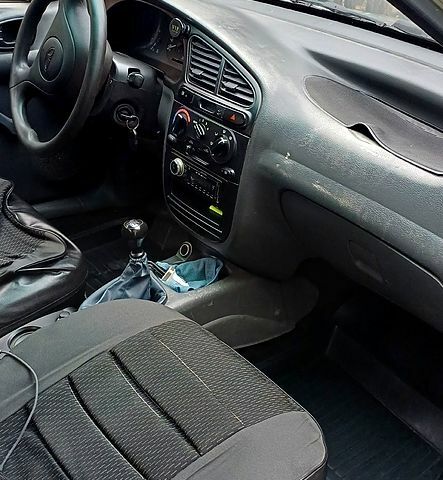 Серый Дэу Ланос, объемом двигателя 1.4 л и пробегом 340 тыс. км за 1950 $, фото 4 на Automoto.ua