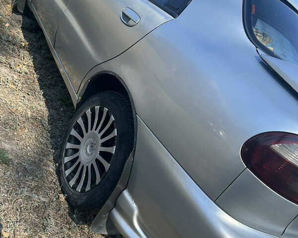 Сірий Деу Ланос, об'ємом двигуна 1.5 л та пробігом 290 тис. км за 2000 $, фото 3 на Automoto.ua