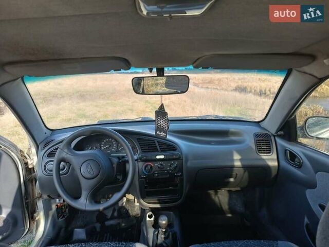 Серый Дэу Ланос, объемом двигателя 1.6 л и пробегом 299 тыс. км за 1720 $, фото 6 на Automoto.ua