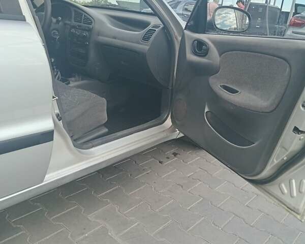 Серый Дэу Ланос, объемом двигателя 1.5 л и пробегом 225 тыс. км за 2400 $, фото 2 на Automoto.ua