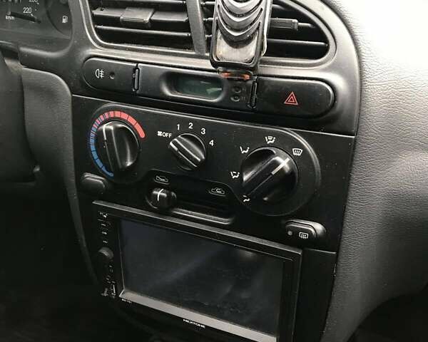 Сірий Деу Ланос, об'ємом двигуна 1.5 л та пробігом 108 тис. км за 3100 $, фото 19 на Automoto.ua