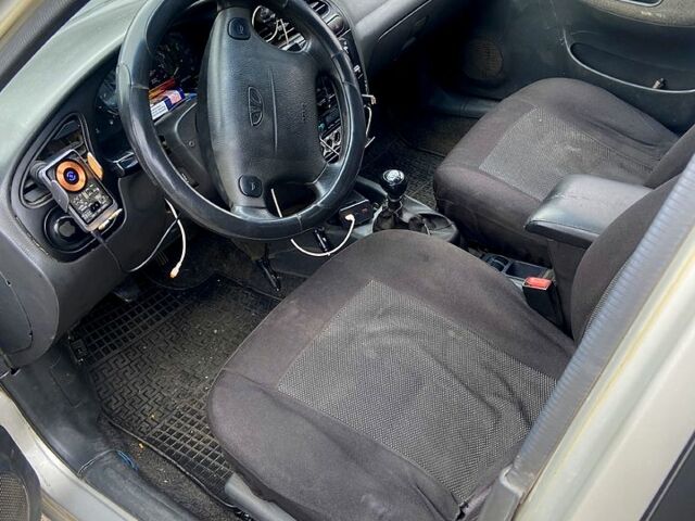 Серый Дэу Ланос, объемом двигателя 1.6 л и пробегом 260 тыс. км за 1810 $, фото 4 на Automoto.ua