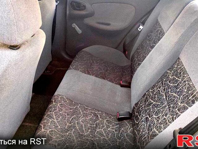 Сірий Деу Ланос, об'ємом двигуна 1.5 л та пробігом 102 тис. км за 2499 $, фото 2 на Automoto.ua