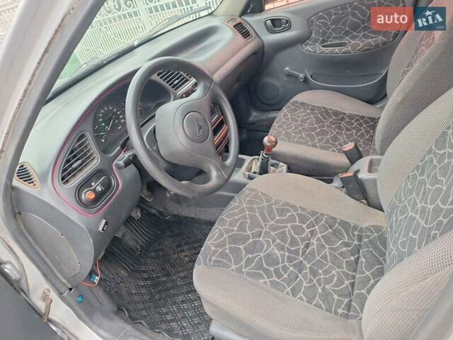 Сірий Деу Ланос, об'ємом двигуна 1.3 л та пробігом 111 тис. км за 1100 $, фото 26 на Automoto.ua