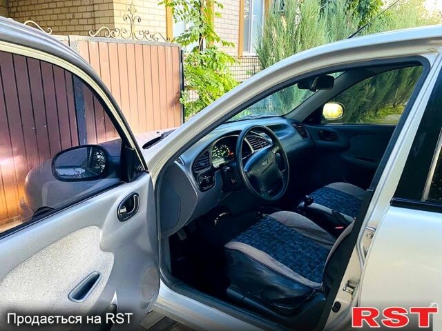 Сірий Деу Ланос, об'ємом двигуна 1.6 л та пробігом 150 тис. км за 2700 $, фото 7 на Automoto.ua