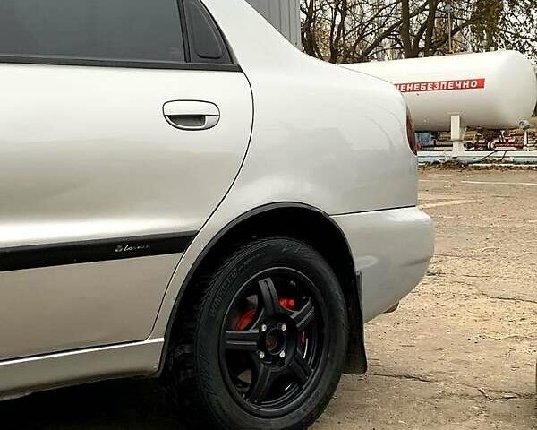 Сірий Деу Ланос, об'ємом двигуна 1.5 л та пробігом 384 тис. км за 2999 $, фото 2 на Automoto.ua