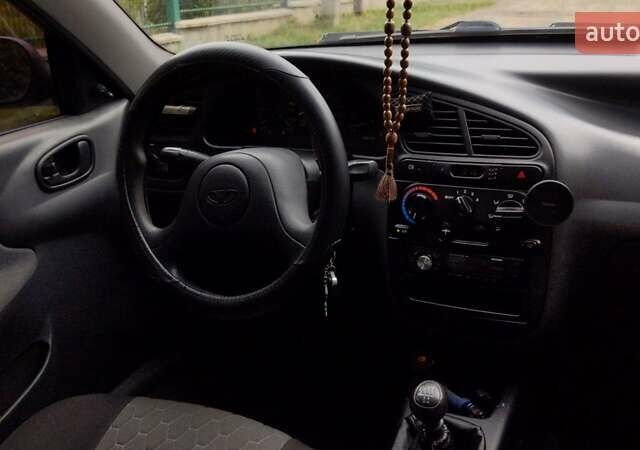 Серый Дэу Ланос, объемом двигателя 1.5 л и пробегом 210 тыс. км за 2000 $, фото 17 на Automoto.ua