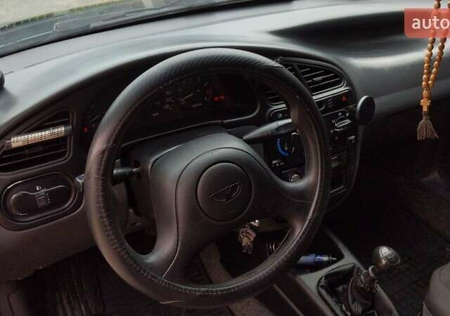 Серый Дэу Ланос, объемом двигателя 1.5 л и пробегом 210 тыс. км за 2000 $, фото 13 на Automoto.ua