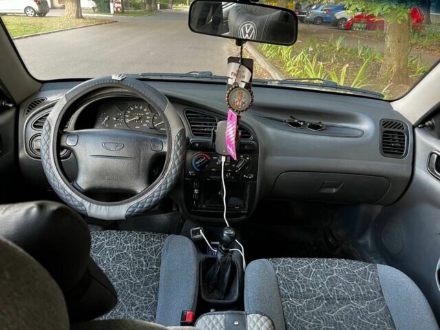 Серый Дэу Ланос, объемом двигателя 1.6 л и пробегом 151 тыс. км за 2800 $, фото 2 на Automoto.ua