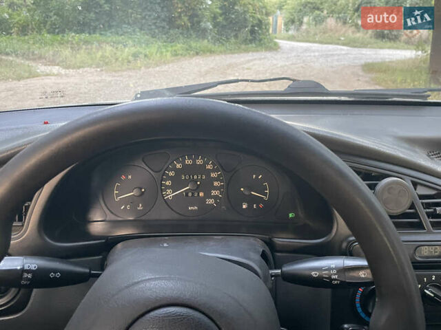 Сірий Деу Ланос, об'ємом двигуна 1.5 л та пробігом 300 тис. км за 1800 $, фото 11 на Automoto.ua