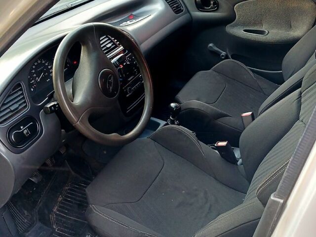 Серый Дэу Ланос, объемом двигателя 1.5 л и пробегом 244 тыс. км за 2650 $, фото 6 на Automoto.ua