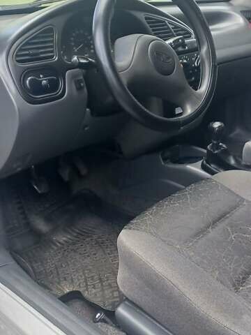 Деу Ланос 2008 у Буче на Automoto.ua Сірий Деу Ланос, об'ємом двигуна 1.39 л та пробігом 265 тис. км за 2050 $, фото 3 на Automoto.ua