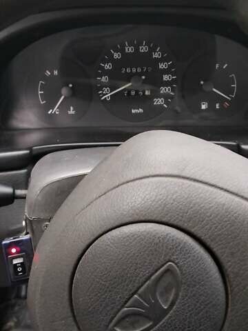 Серый Дэу Ланос, объемом двигателя 1.5 л и пробегом 280 тыс. км за 2000 $, фото 7 на Automoto.ua