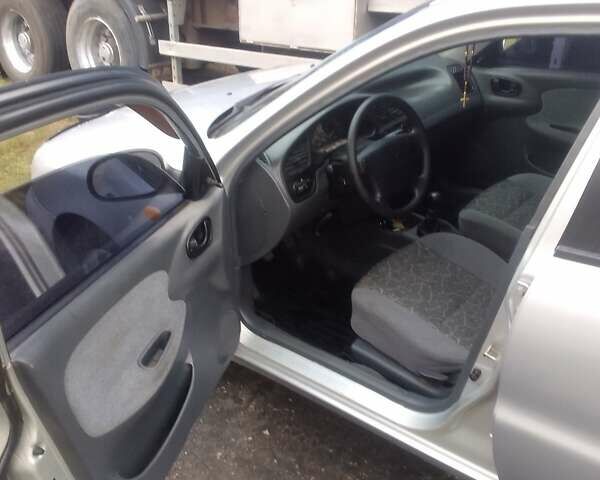 Серый Дэу Ланос, объемом двигателя 1.6 л и пробегом 203 тыс. км за 2900 $, фото 13 на Automoto.ua