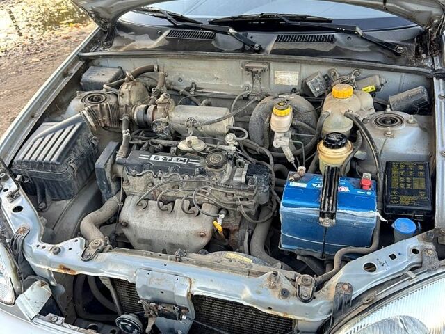 Деу Ланос 2008 у Александрие на Automoto.ua Сірий Деу Ланос, об'ємом двигуна 1.5 л та пробігом 175 тис. км за 2750 $, фото 12 на Automoto.ua