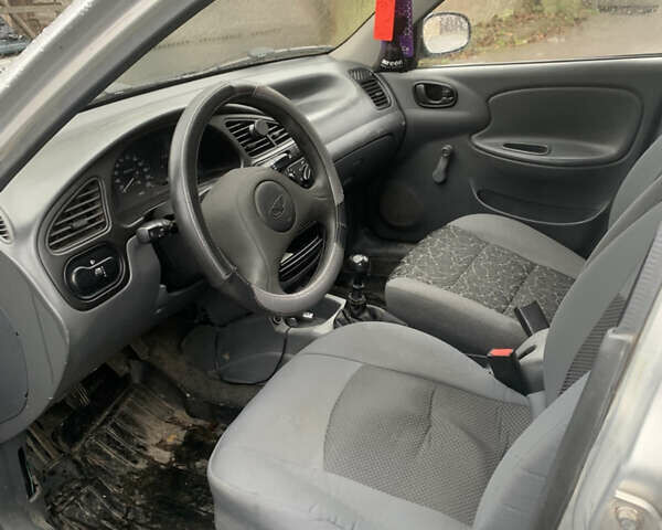 Сірий Деу Ланос, об'ємом двигуна 1.39 л та пробігом 189 тис. км за 1450 $, фото 8 на Automoto.ua
