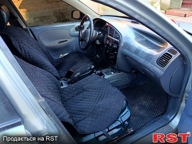 Серый Дэу Ланос, объемом двигателя 1.5 л и пробегом 300 тыс. км за 1300 $, фото 5 на Automoto.ua