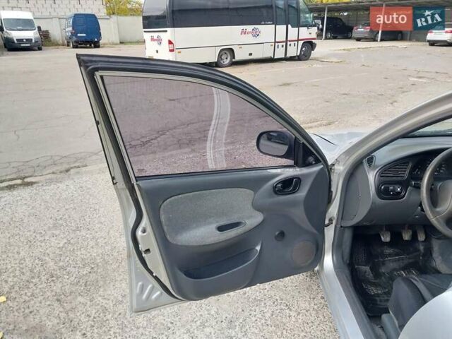 Серый Дэу Ланос, объемом двигателя 1.5 л и пробегом 179 тыс. км за 2000 $, фото 12 на Automoto.ua