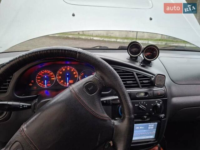 Серый Дэу Ланос, объемом двигателя 1.5 л и пробегом 128 тыс. км за 2550 $, фото 18 на Automoto.ua