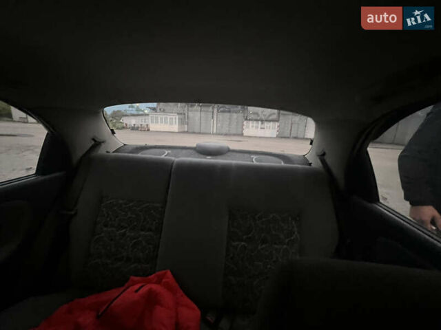 Деу Ланос 2008 у Сарнах на Automoto.ua Сірий Деу Ланос, об'ємом двигуна 1.5 л та пробігом 80 тис. км за 3050 $, фото 5 на Automoto.ua