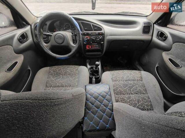 Серый Дэу Ланос, объемом двигателя 1.5 л и пробегом 200 тыс. км за 2000 $, фото 9 на Automoto.ua