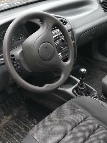 Серый Дэу Ланос, объемом двигателя 1.5 л и пробегом 280 тыс. км за 2000 $, фото 4 на Automoto.ua